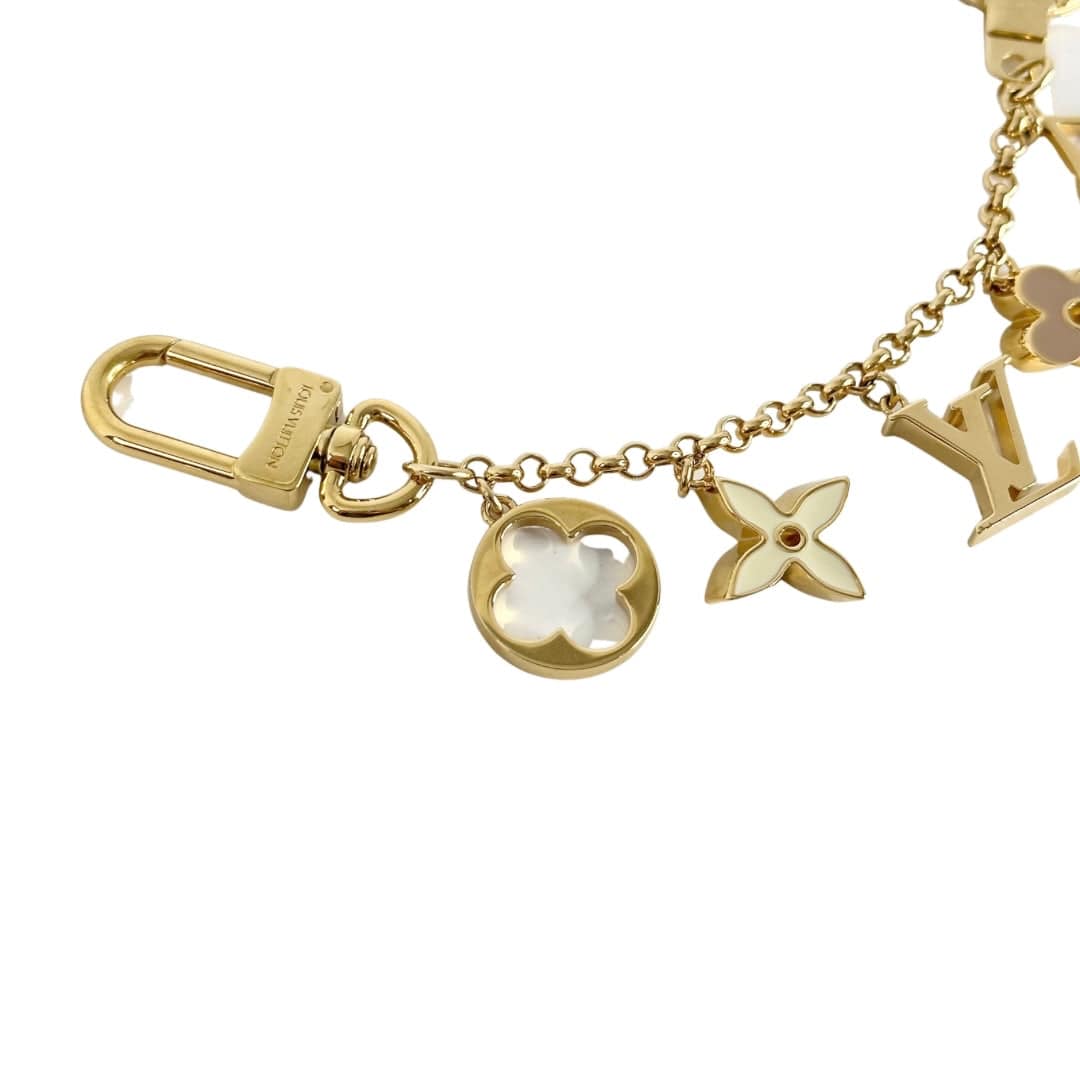 Louis Vuitton FLEUR DE MONOGRAM BAG CHARM CHAIN M65111  Girly jewelry, Louis  vuitton jewelry, Girly accessories