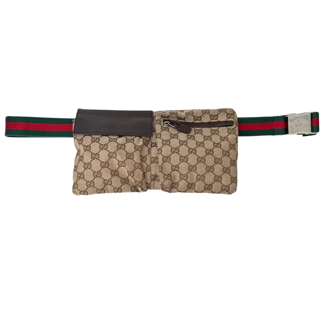 Gucci luxury handbag with belt.