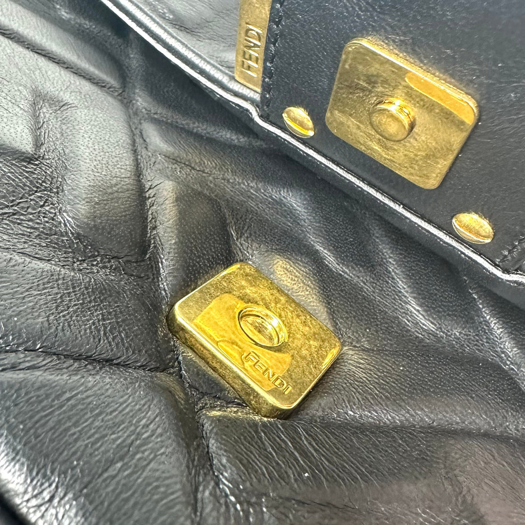 Fendi Embossed FF Monogram Medium Baguette Shoulder Bag